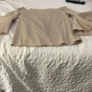 Jennifer Lopez off the shoulder bell sleeve shirt